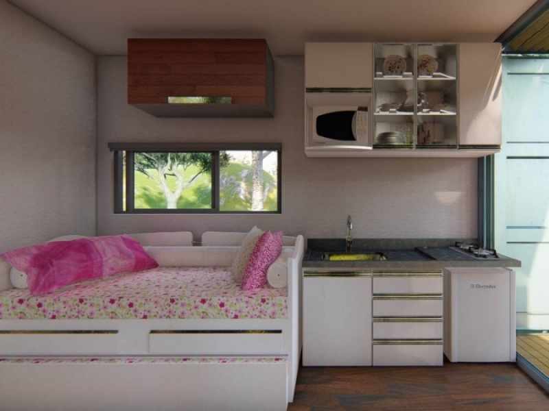 Casa de contenedor de lujo - Conozca sus ventajas - Disposición del sofá-cama y la cocina en el área principal