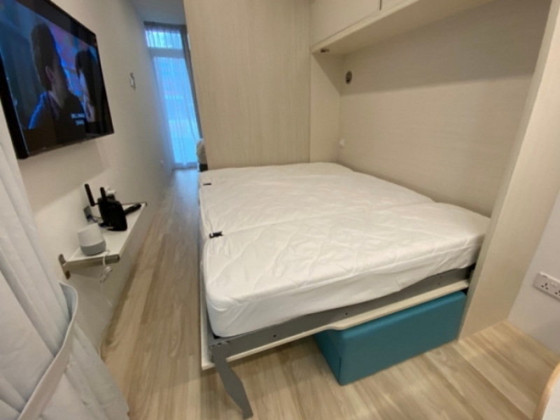 Casa contenedor marítimo - Hotel Block 77 Ayer Rajah Crescent - El living tambien cuenta con cama queen size desplegable.