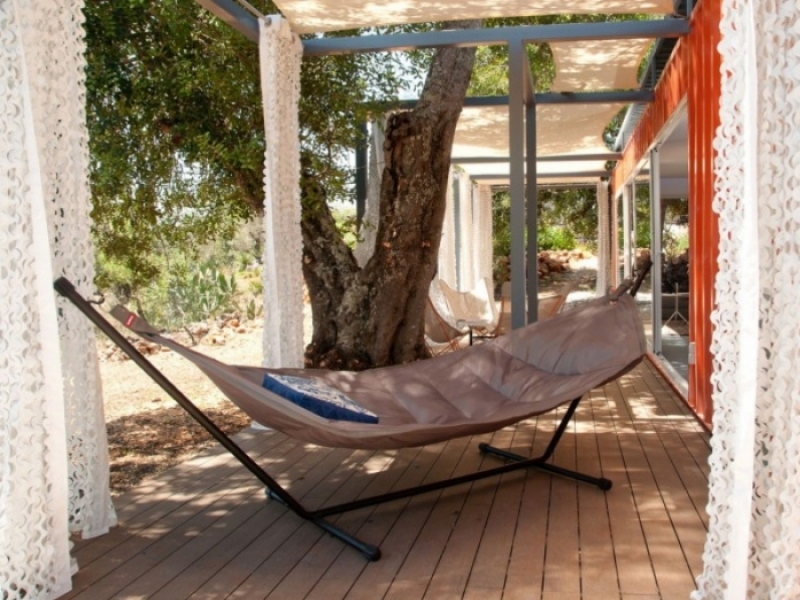 Nomad Living por Studio Arte arquitectura y diseño - Una siesta en esta hamaca y bajo esta sombra es impagable.